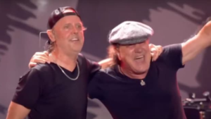 AC/DC's Brian Johnson with Metallica's Lars Ulrich on Drums Perform 'Back in Black' During The Taylor Hawkins Tribute Concert in Wembley Stadium on September 3, 2022