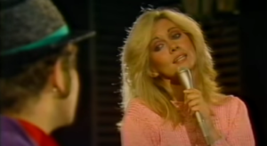 Olivia Newton-John and Elton John Performing 'Candle In The Wind' Live in 1980